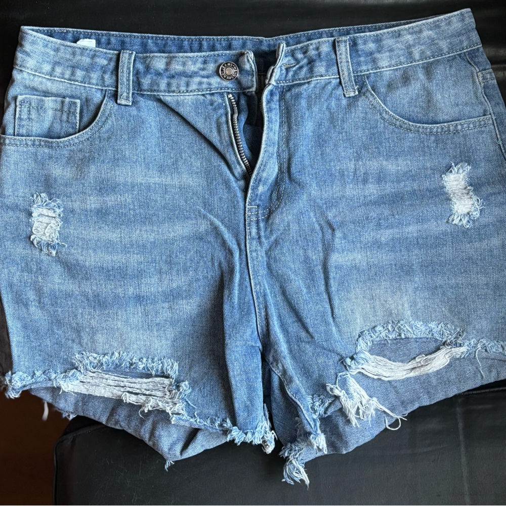 2 pairs of blue denim shorts. Sizes large and extra large